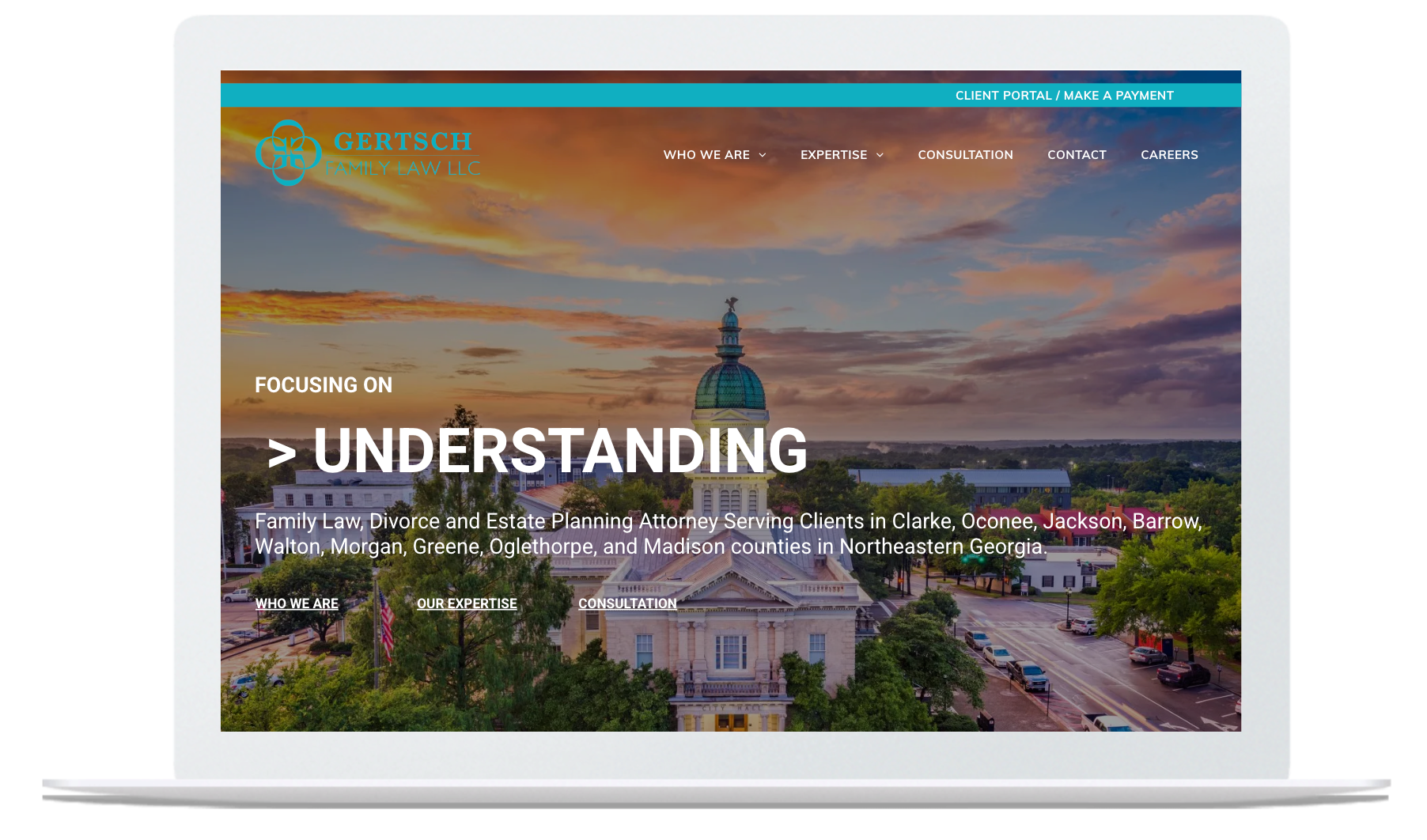 Laptop displaying the website for 