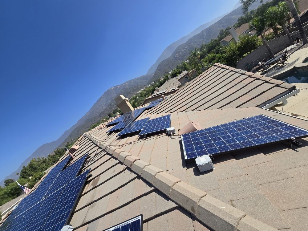 A roof with a lot of solar panels on it