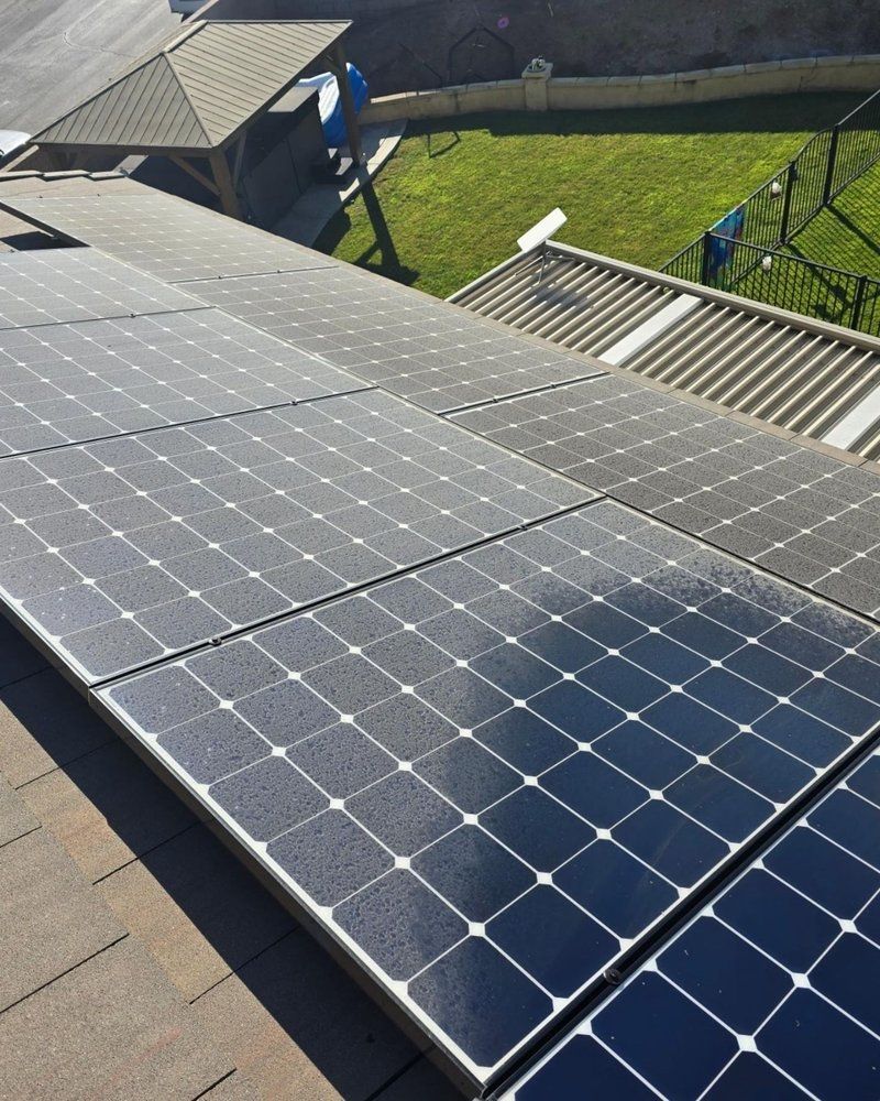 A roof with a lot of solar panels on it