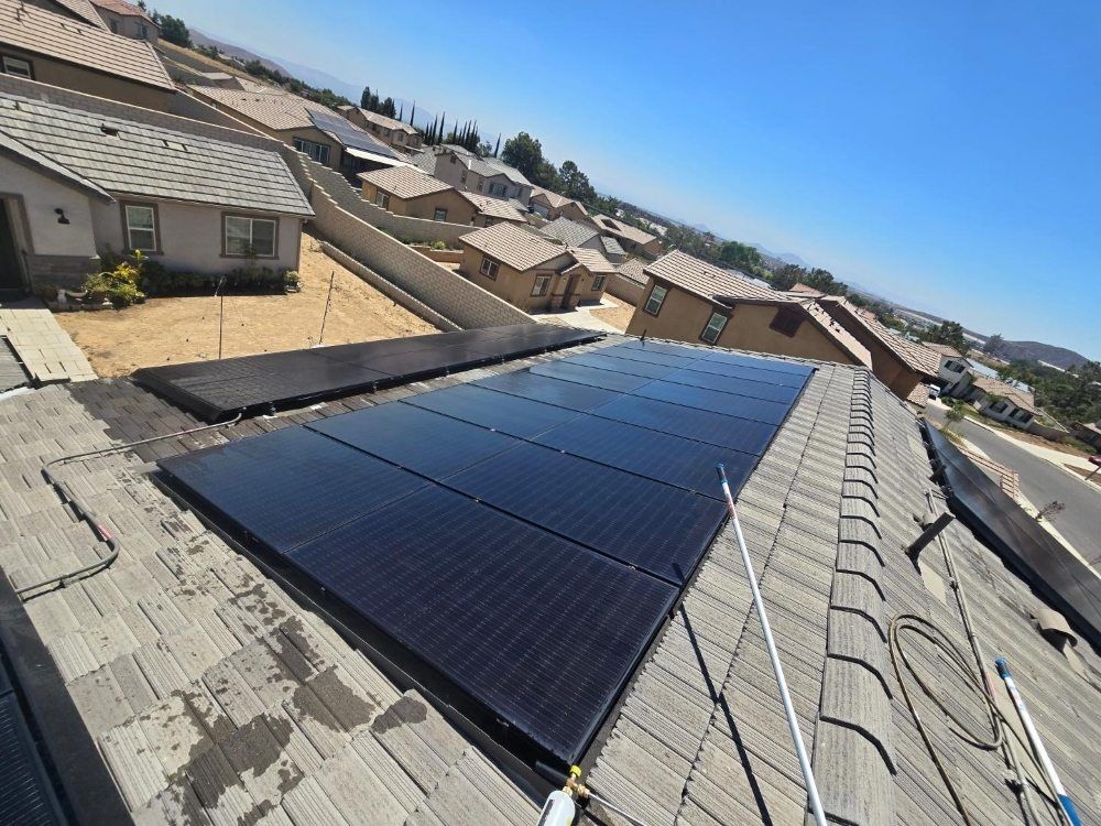 A roof with a lot of solar panels on it