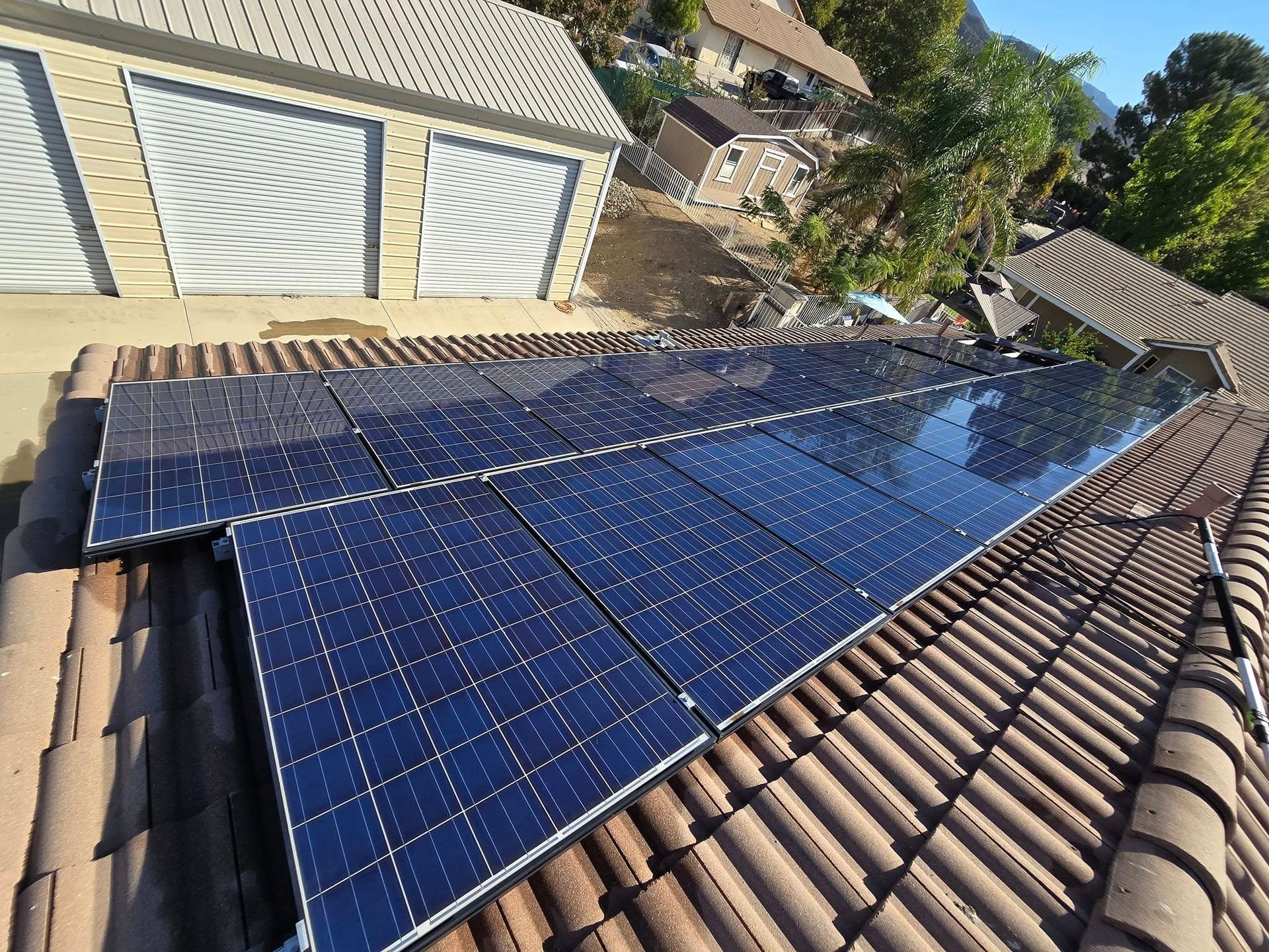 A roof with a lot of solar panels on it