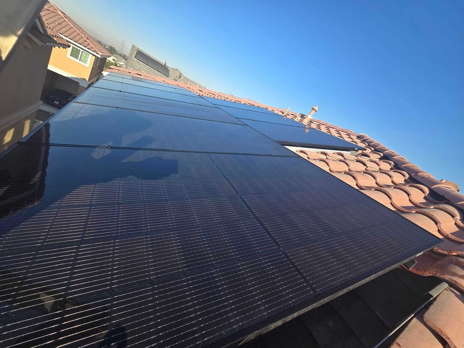 A roof with a lot of solar panels on it