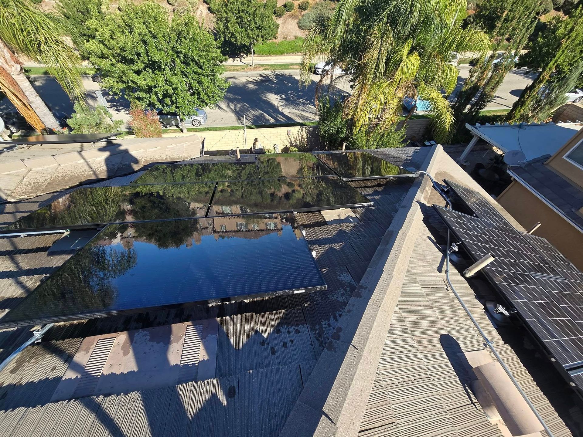 A roof with a lot of solar panels on it