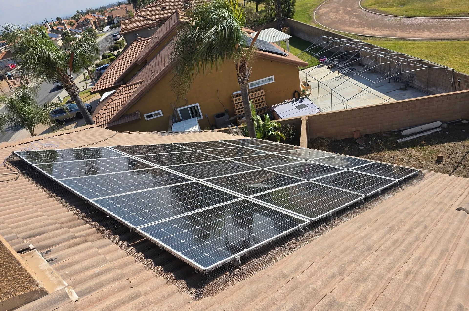 A roof with a lot of solar panels on it