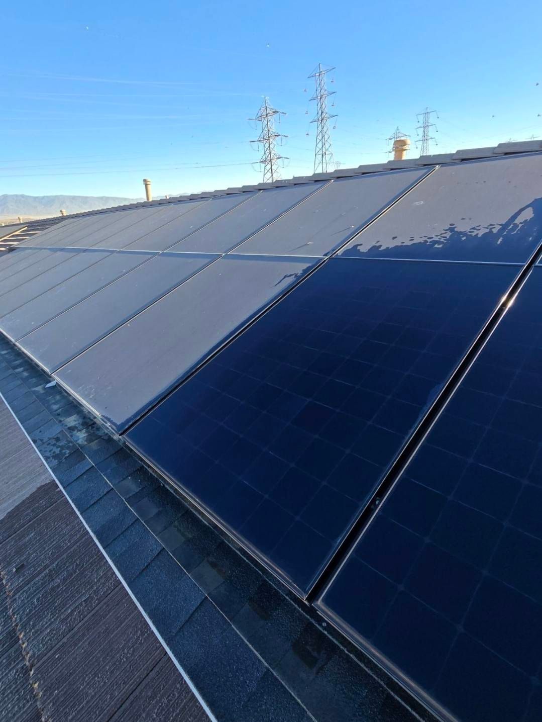 A roof with a lot of solar panels on it