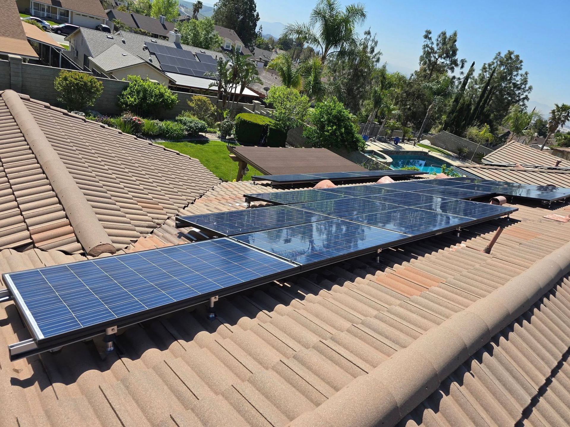 A roof with a lot of solar panels on it