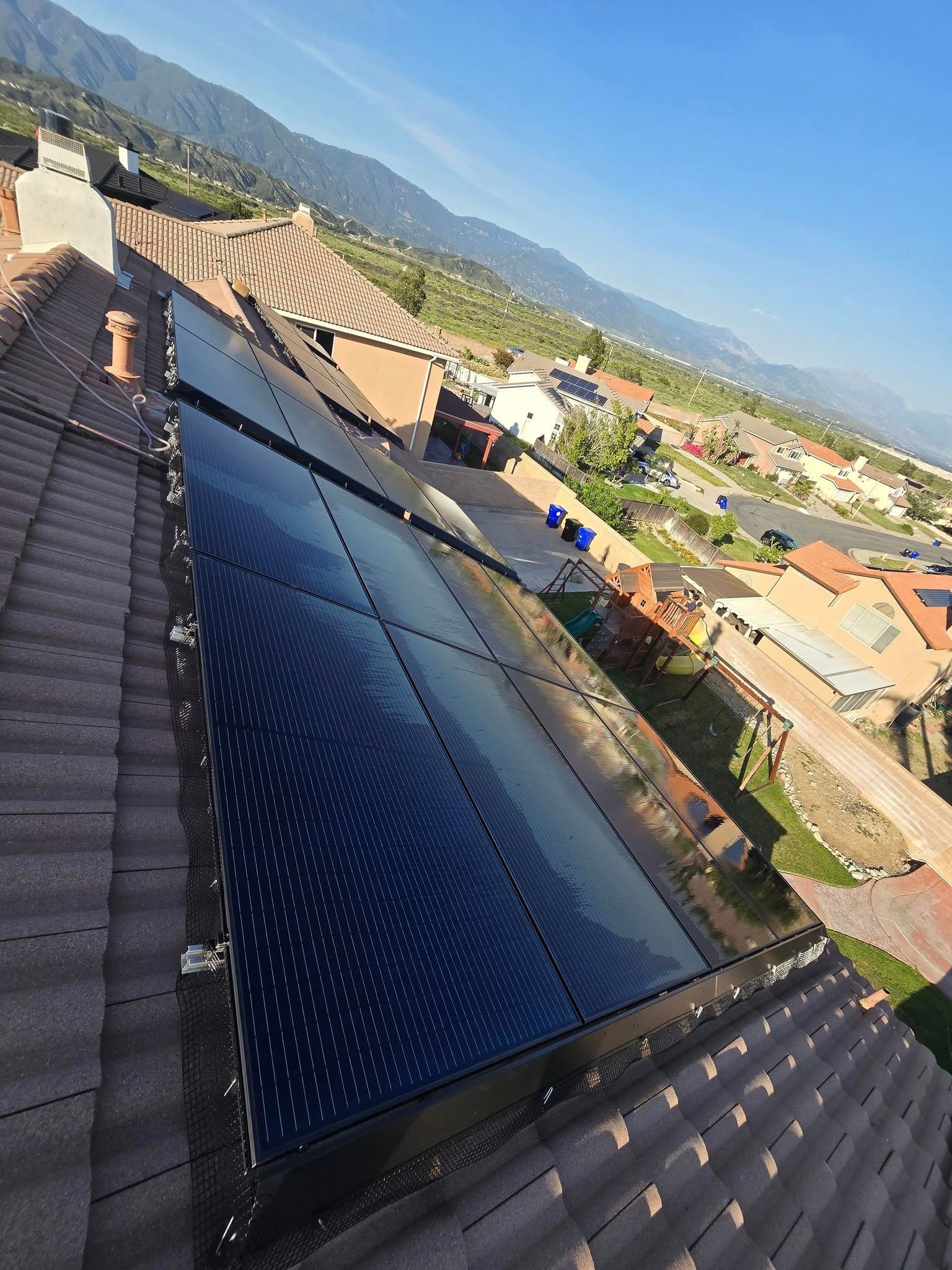 A roof with a lot of solar panels on it