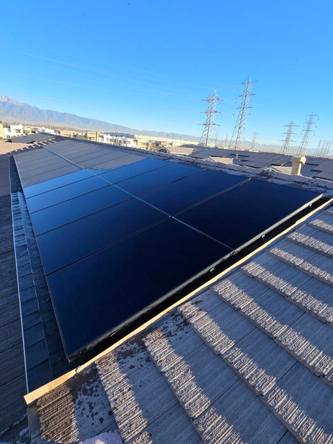 A roof with a lot of solar panels on it