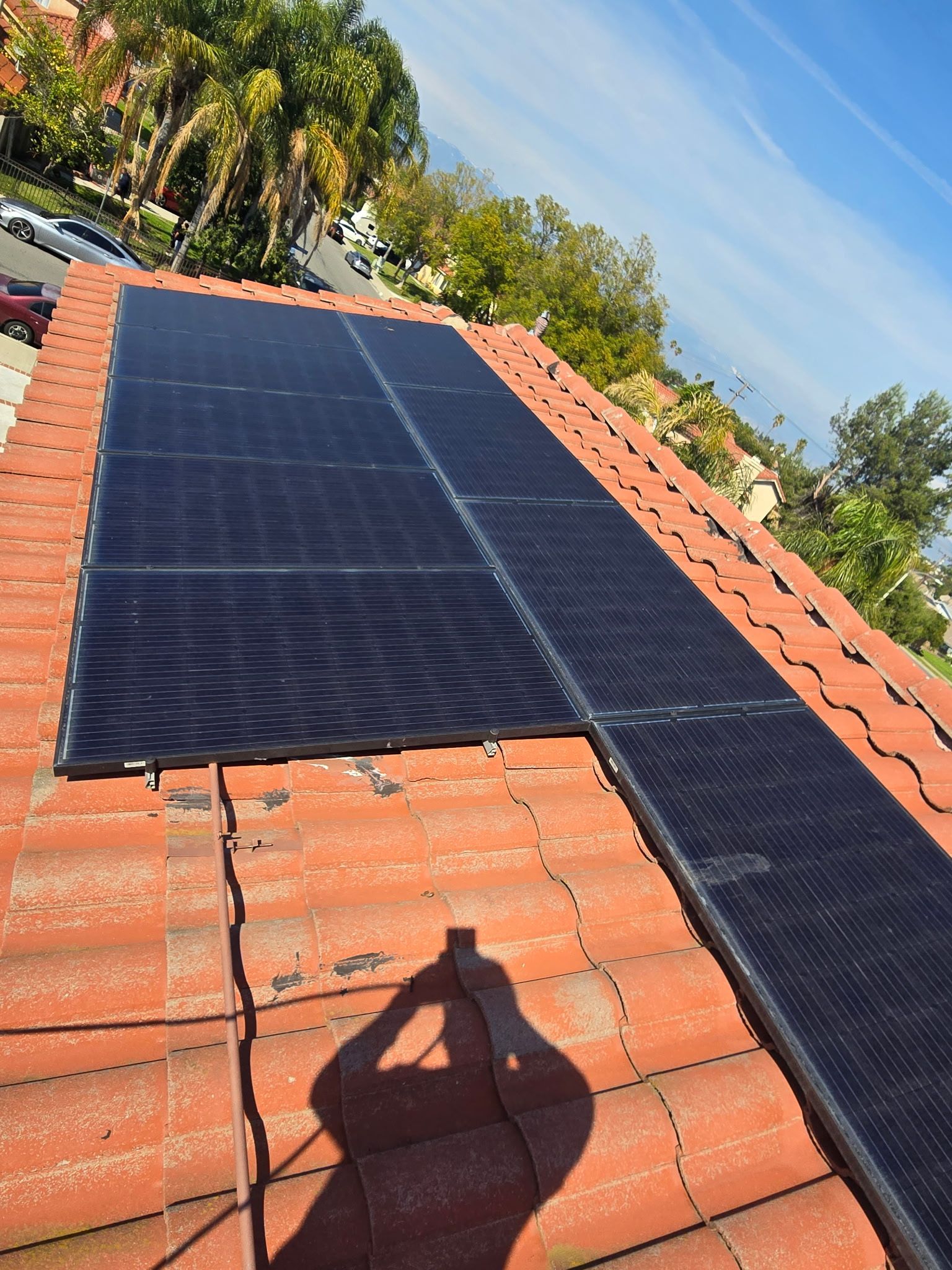 A roof with a lot of solar panels on it