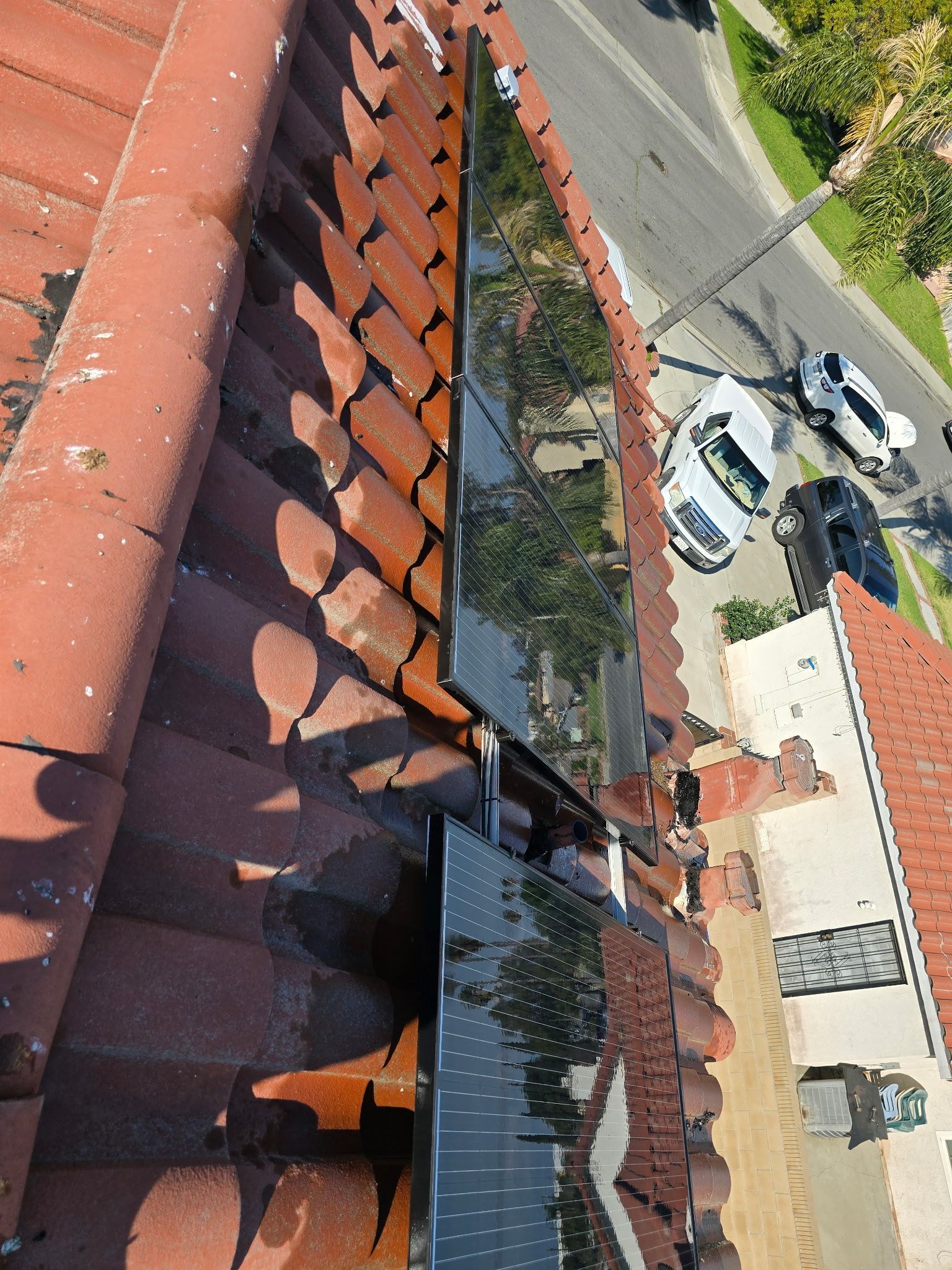 An aerial view of a roof with a gutter on it.