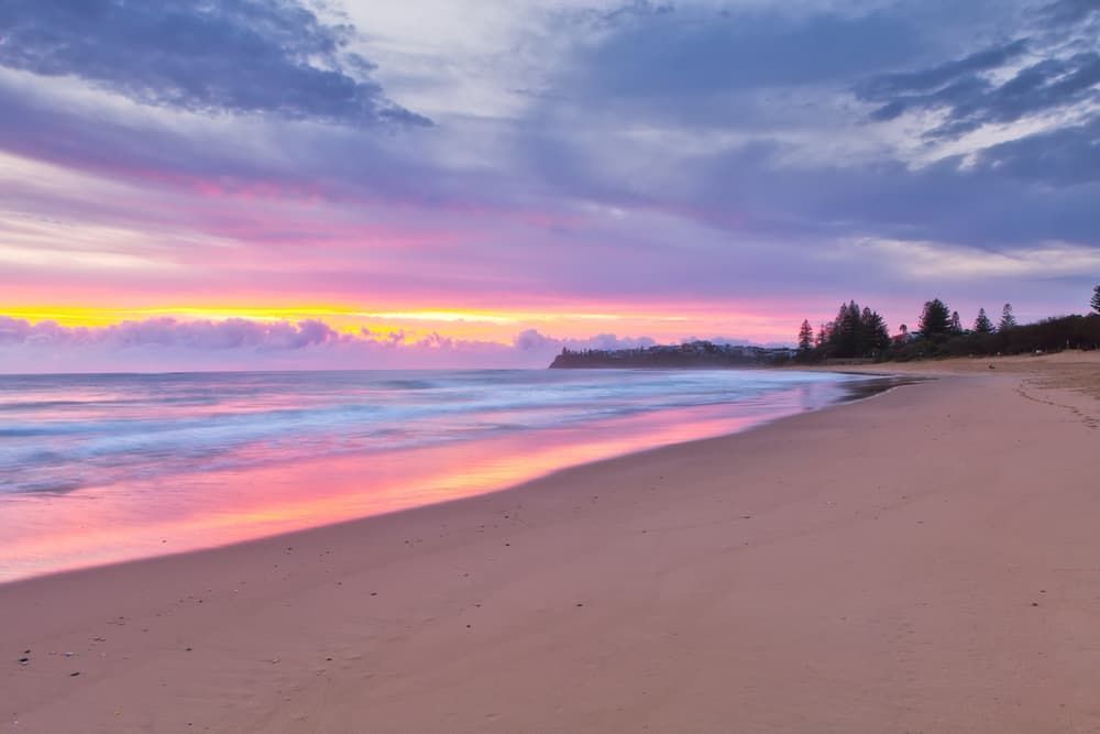 Beach With A Sunset And Trees — Billabong Springs in Sunshine Coast, QLD
