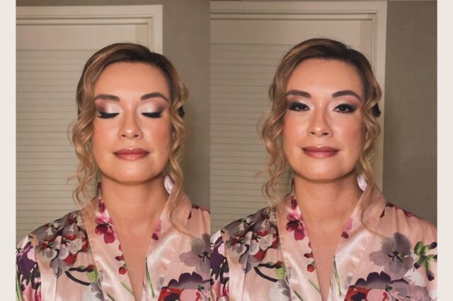 A woman in a floral robe is getting ready for a wedding.