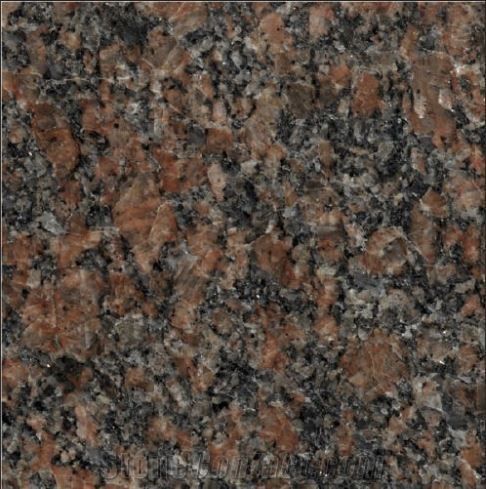 Close-up of polished granite stone with a speckled texture in shades of reddish-brown, charcoal gray, and tan.