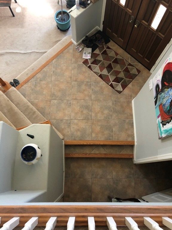 An aerial view of a staircase in a house