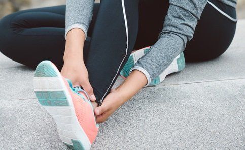 Foot Care — Runner with Injured Ankle in Chicago, IL