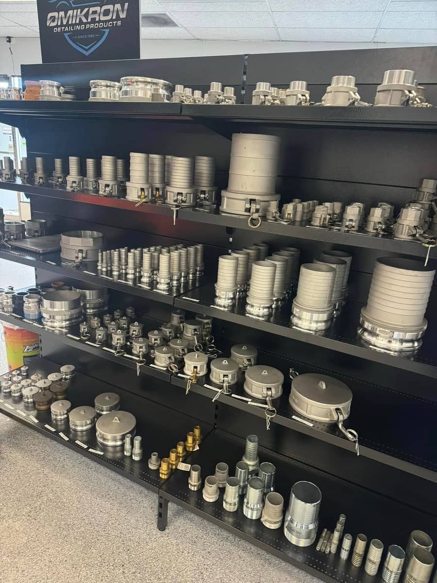 A Display Case Filled With Lots of Different Types of Pipes and Fittings — Aushose Canberra In Fyshwick, ACT