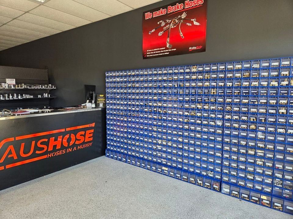 A Large Wall of Blue Drawers in a Store Called Aushouse — Aushose Canberra In Fyshwick, ACT