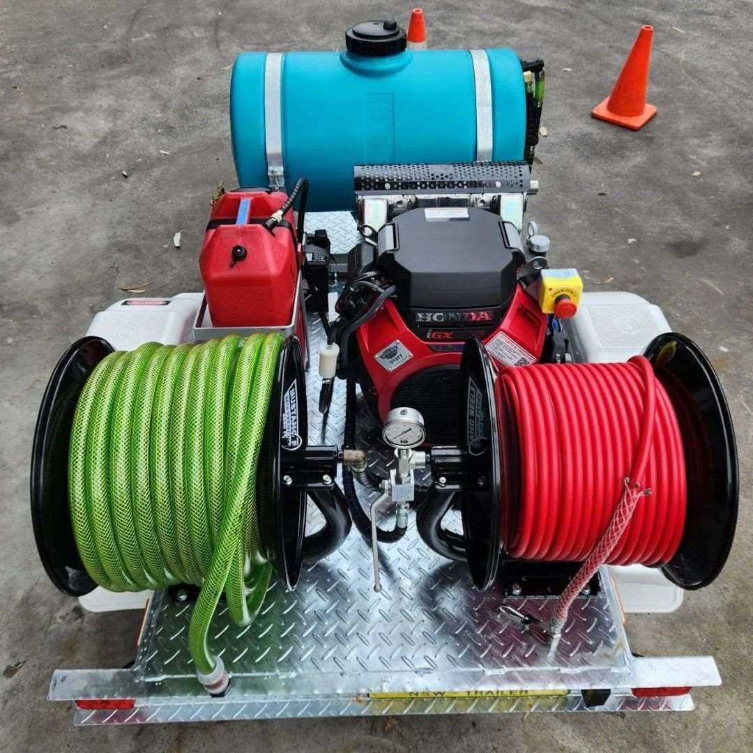A Red and Green Hose is Attached to a Machine — Aushose Canberra In Fyshwick, ACT