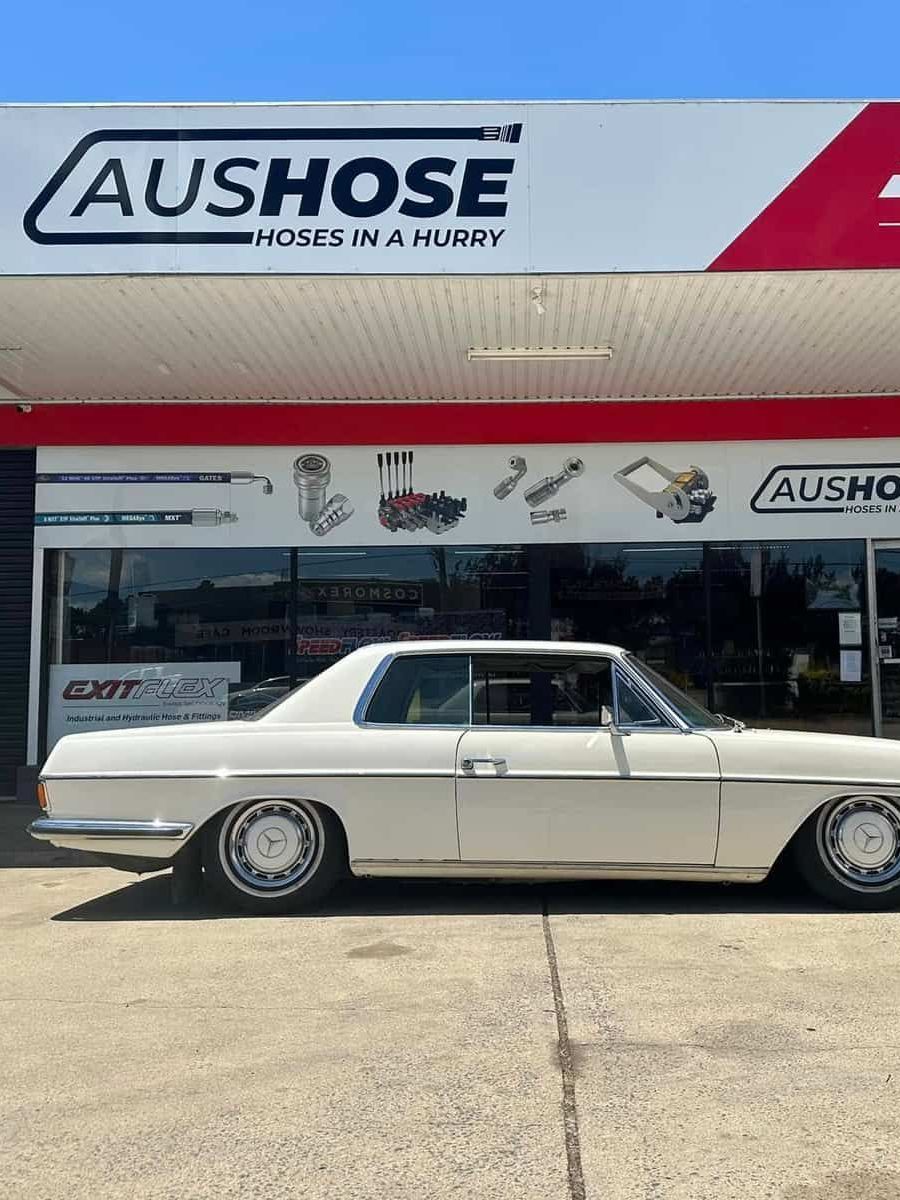 A White Car is Parked in Front of a Gas Station — Aushose Canberra In Fyshwick, ACT
