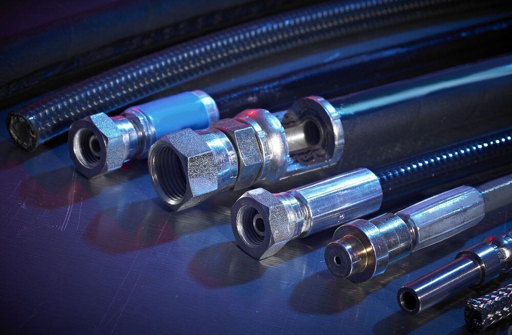 A Bunch of Hydraulic Hoses Are Sitting on Top of Each Other on a Table — Aushose Canberra In Fyshwick, ACT
