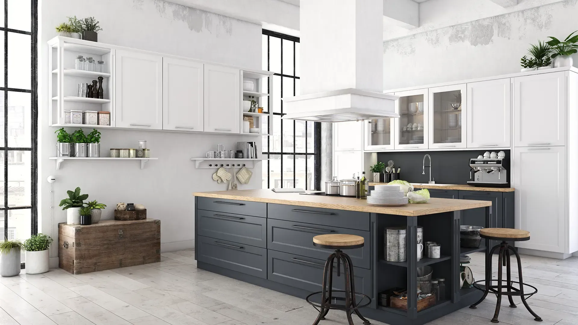 Une cuisine moderne avec des armoires blanches et un grand îlot au milieu.