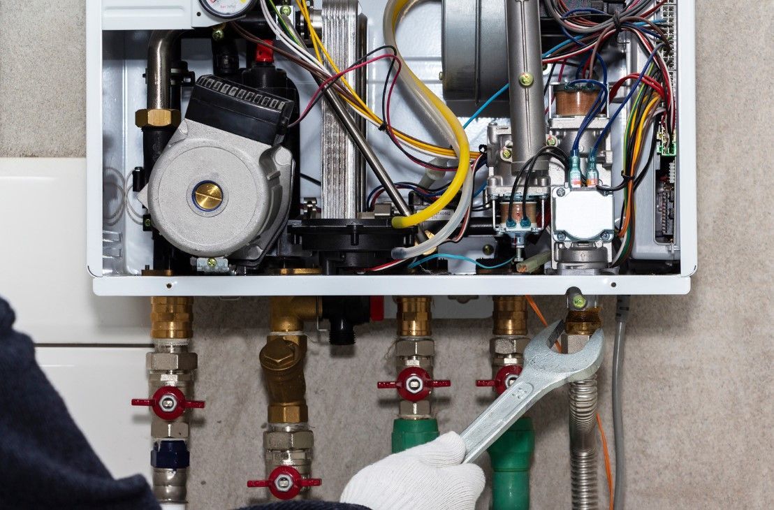 Derbyshire Plumbing & Heating Specialists carrying out a gas boiler service Derby