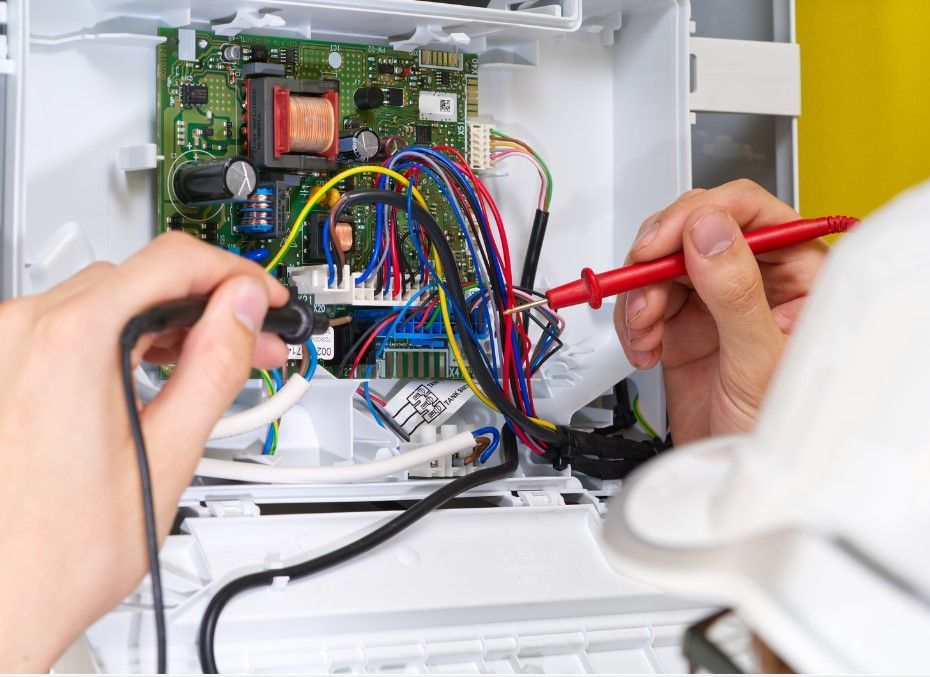 Central heating engineering performing a boiler service