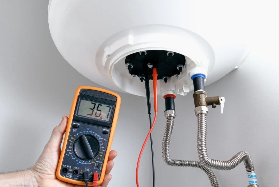 Derbyshire Plumbing & Heating Specialists testing a hot water tank in Belper