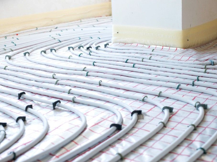Derbyshire Plumbing & Heating Specialists installing underfloor heating in Derby