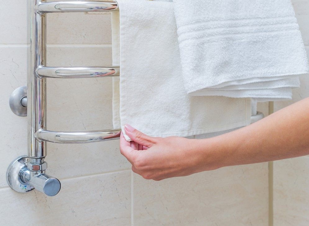 Derbyshire Plumbing & Heating Specialists drying towels on a new towel radiator