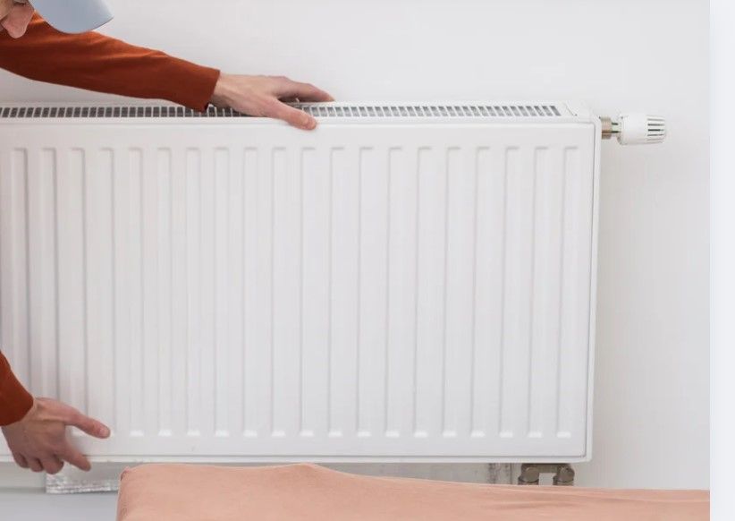Derbyshire Plumbing & Heating Specialists checking a new central heating system installed in Derby