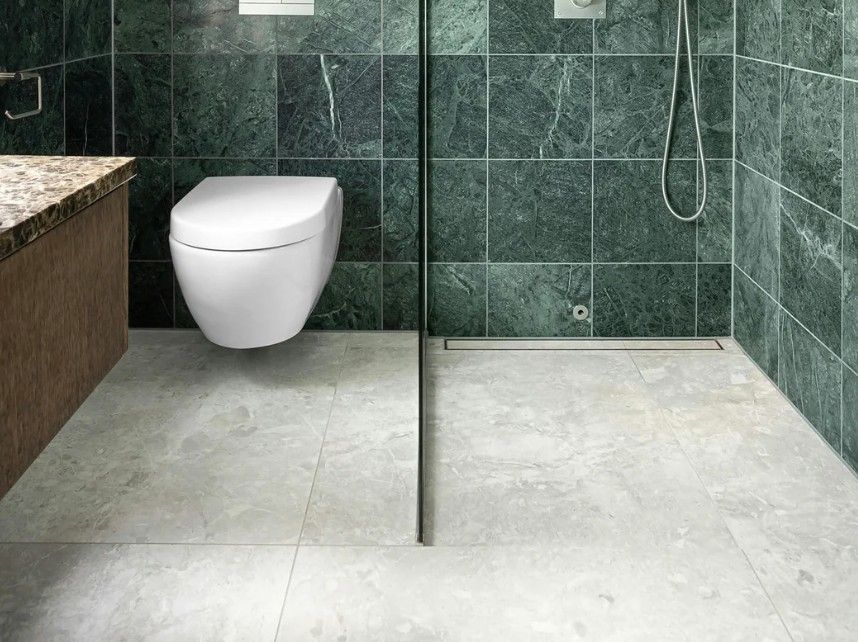 Derbyshire Plumbing & Heating Specialists wet room area screened from toilet in a bathroom in Derby