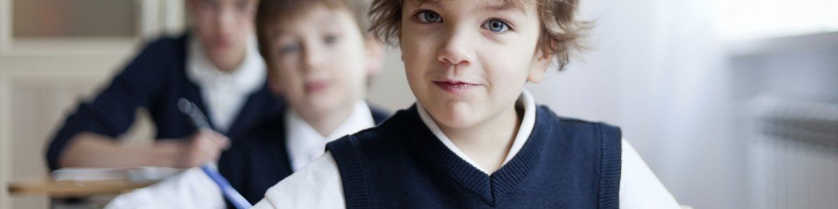 brunella school wear kids in a class room wearing school uniform