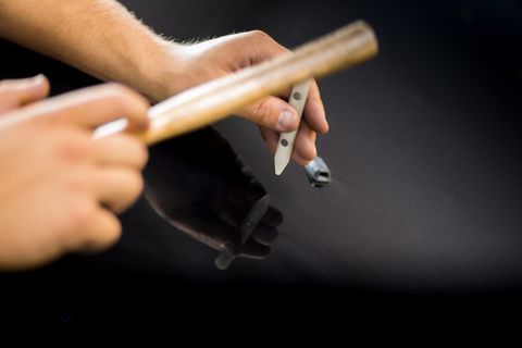 Dent Repair — Technician Polishing Car in Colorado Springs, CO