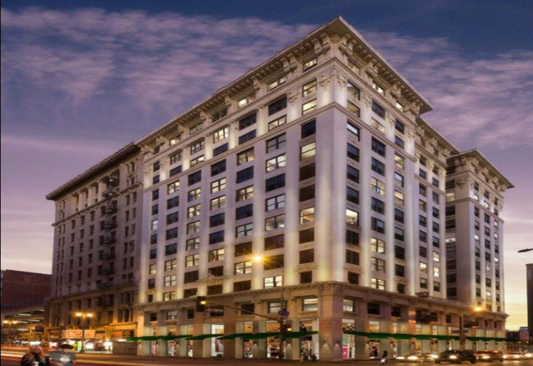 Exterior view of The Chapman Flats building at night