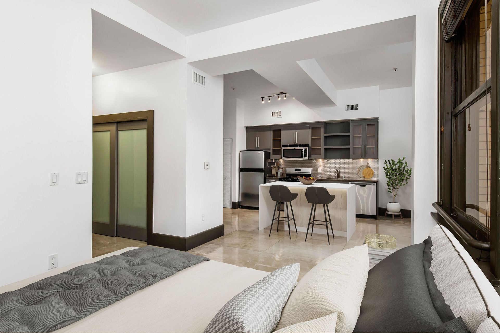 Living room with view of kitchen