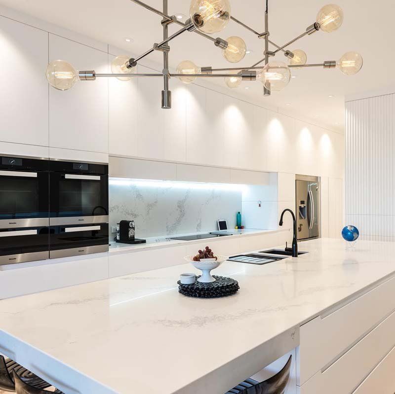 white kitchen with white counter tops