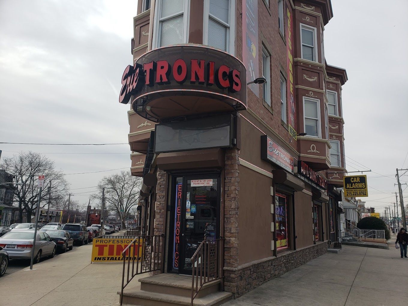 A building with a sign that says tronics on it