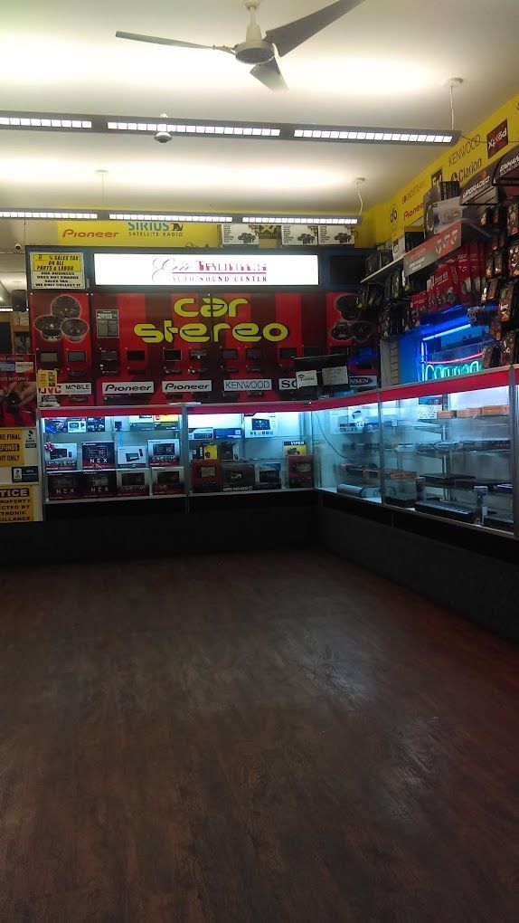 A store with a sign that says car stereo on it