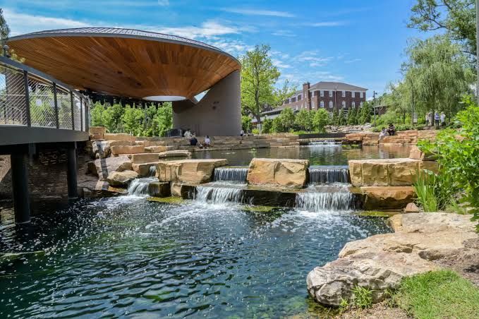 Modern waterfall and pavilion at Downtown Cary Park-a top destination for residents moving to Cary, NC.
