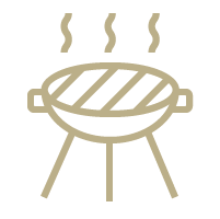 An icon of a grill with smoke coming out of it.