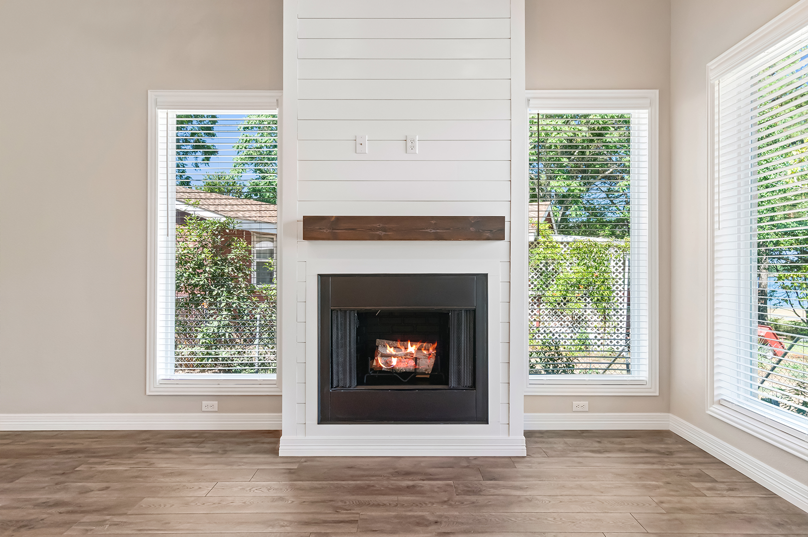 There is a fireplace in the middle of the room.