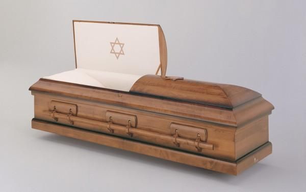 a coffin with the lid open and Star of David on inside