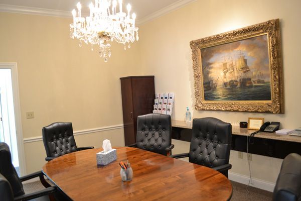 Several photos of interior and exterior views of A.R.N Funeral & Cremation Services, Aaron-Ruben-Nelson Mortuary in Indiana.