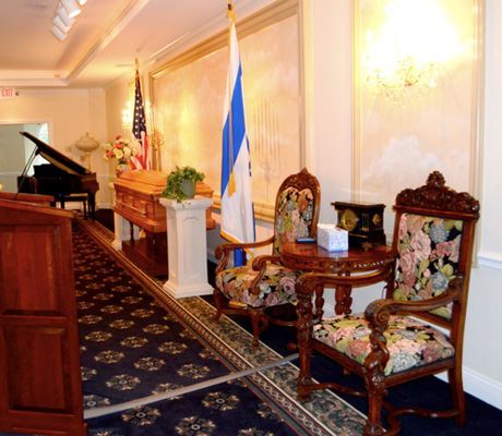 Several photos of interior and exterior views of A.R.N Funeral & Cremation Services, Aaron-Ruben-Nelson Mortuary in Indiana.