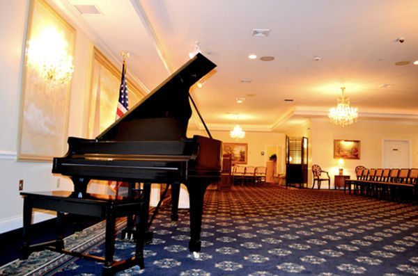 Several photos of interior and exterior views of A.R.N Funeral & Cremation Services, Aaron-Ruben-Nelson Mortuary in Indiana.