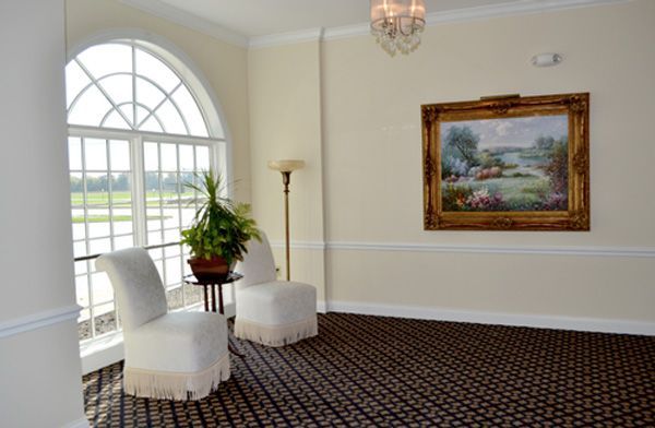 Several photos of interior and exterior views of A.R.N Funeral & Cremation Services, Aaron-Ruben-Nelson Mortuary in Indiana.