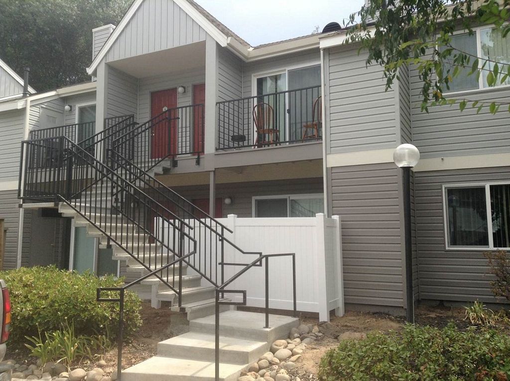 A house with stairs leading up to the second floor