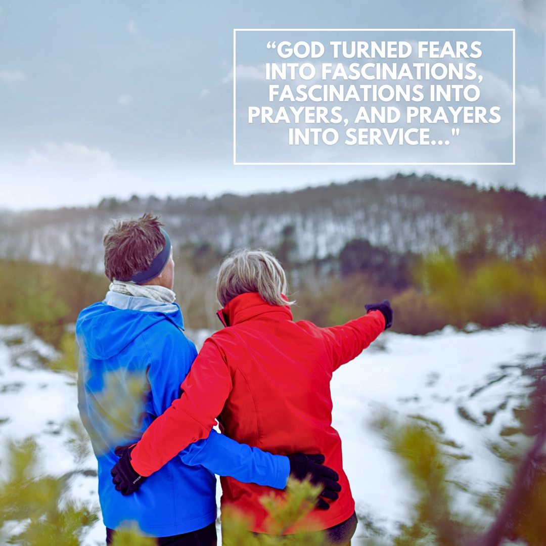 Man and woman looking out at rigorous winter journey ahead.