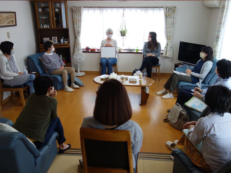 Ladies sitting in a socially distanced circle in Japan